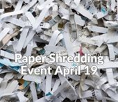 Shredded paper with words saying "Paper Shredding Event"