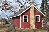 Photo of a little red school house