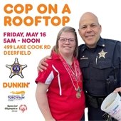 Photo of a Special Olympics athlete and police officer with the words "Cop on a Rooftop" May 16