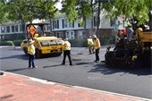 Construction crews paving Waukegan Road